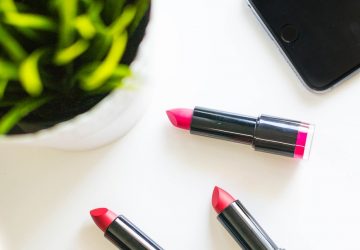 four assorted-color lipsticks