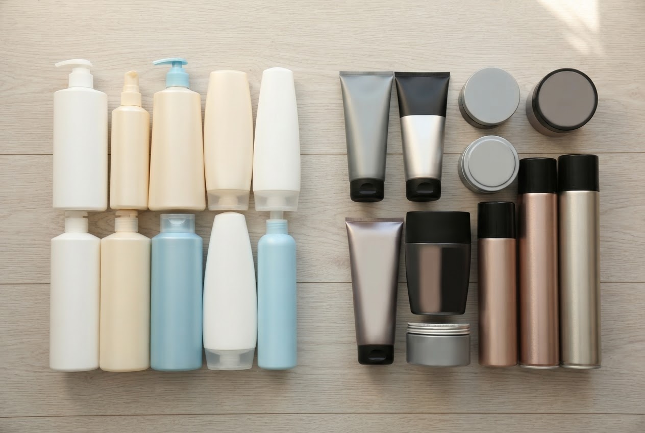 Side-by-side arrangement of hair care products (cleansing and conditioning) and styling products (gel, spray, wax).